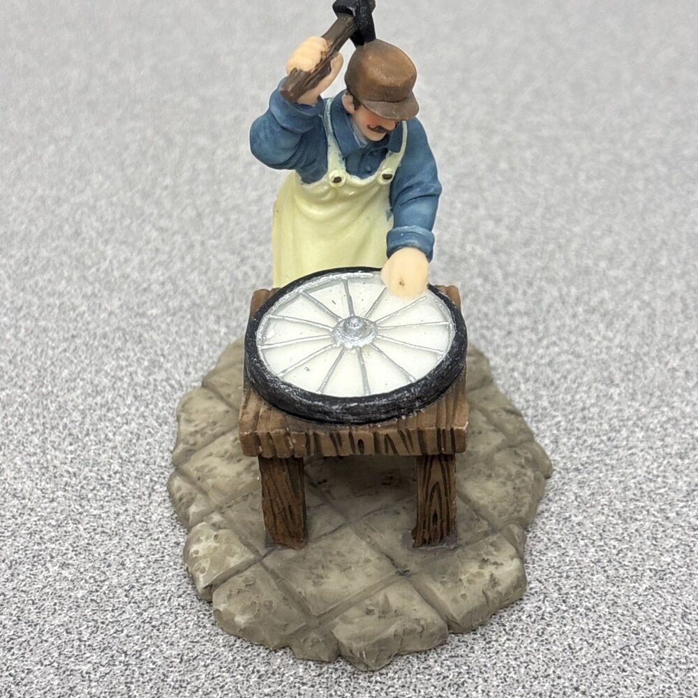 Christmas Village O’well Village Figurine, Man Fixing Wheel